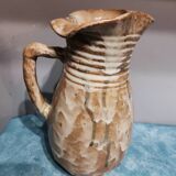 Pitcher signed Eugène Lion