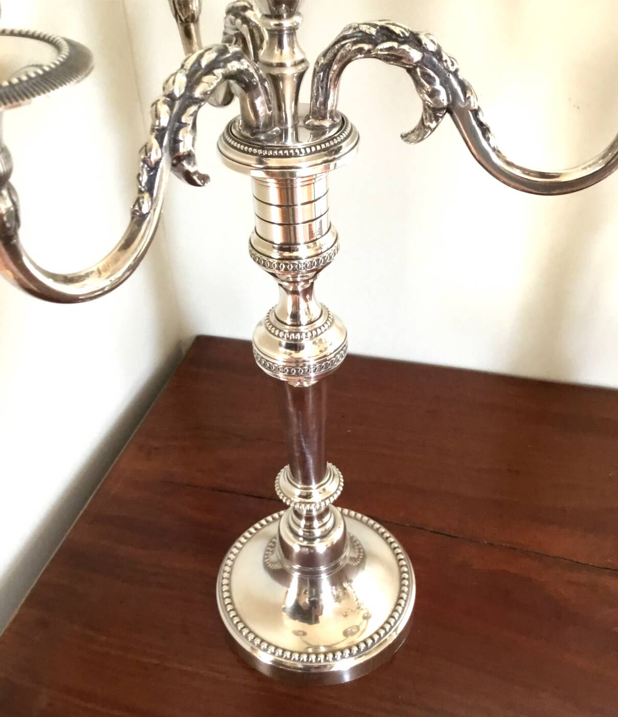 Pair of Louis XVI style silver-plated metal candelabras. Chrysalia house