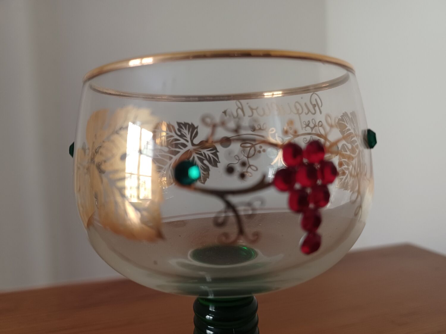 Stemmed glass decorated with vintage spirit