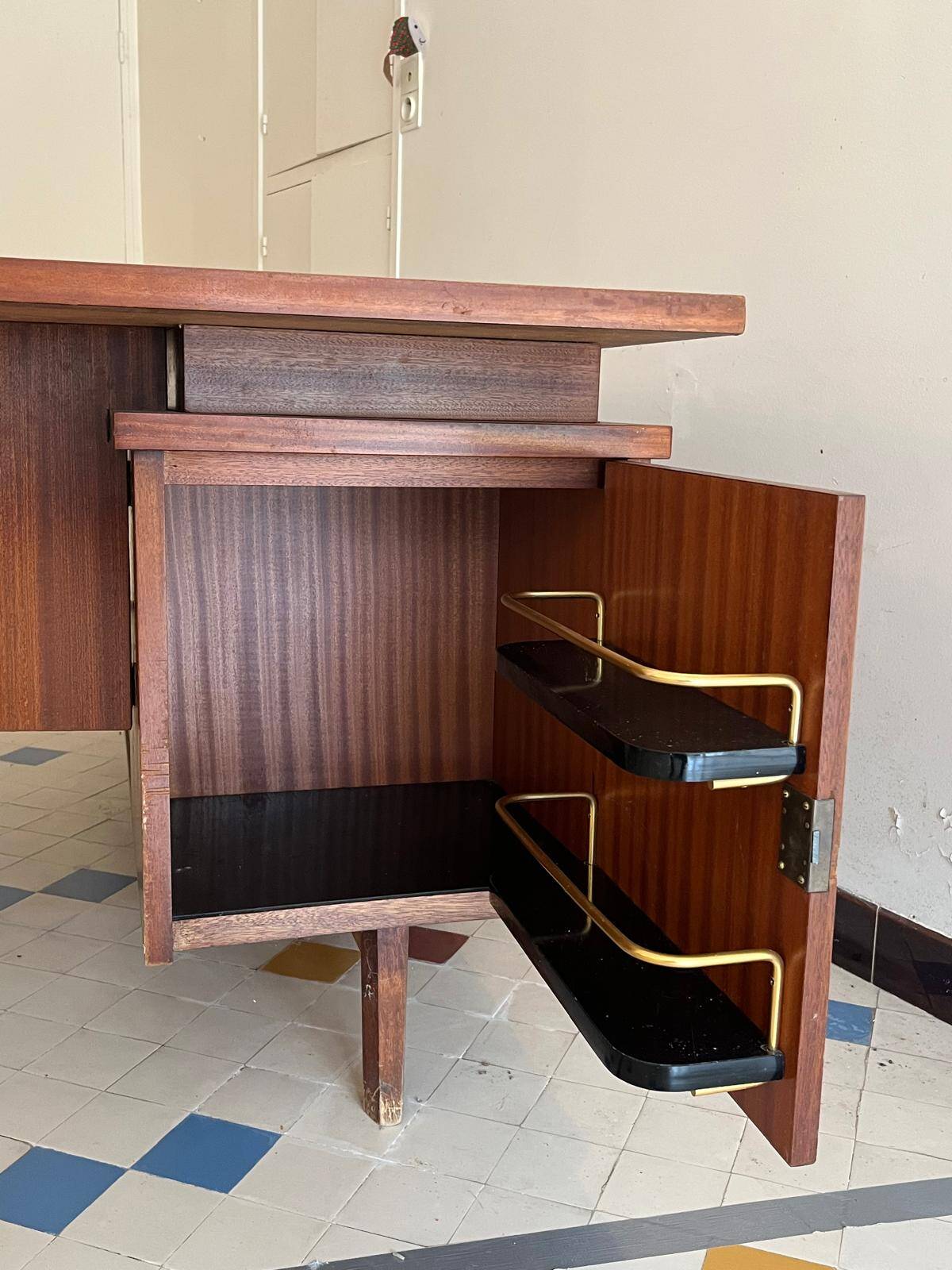 Vintage mahogany executive desk with bar.