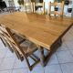 Dining table in solid oak with chairs.
