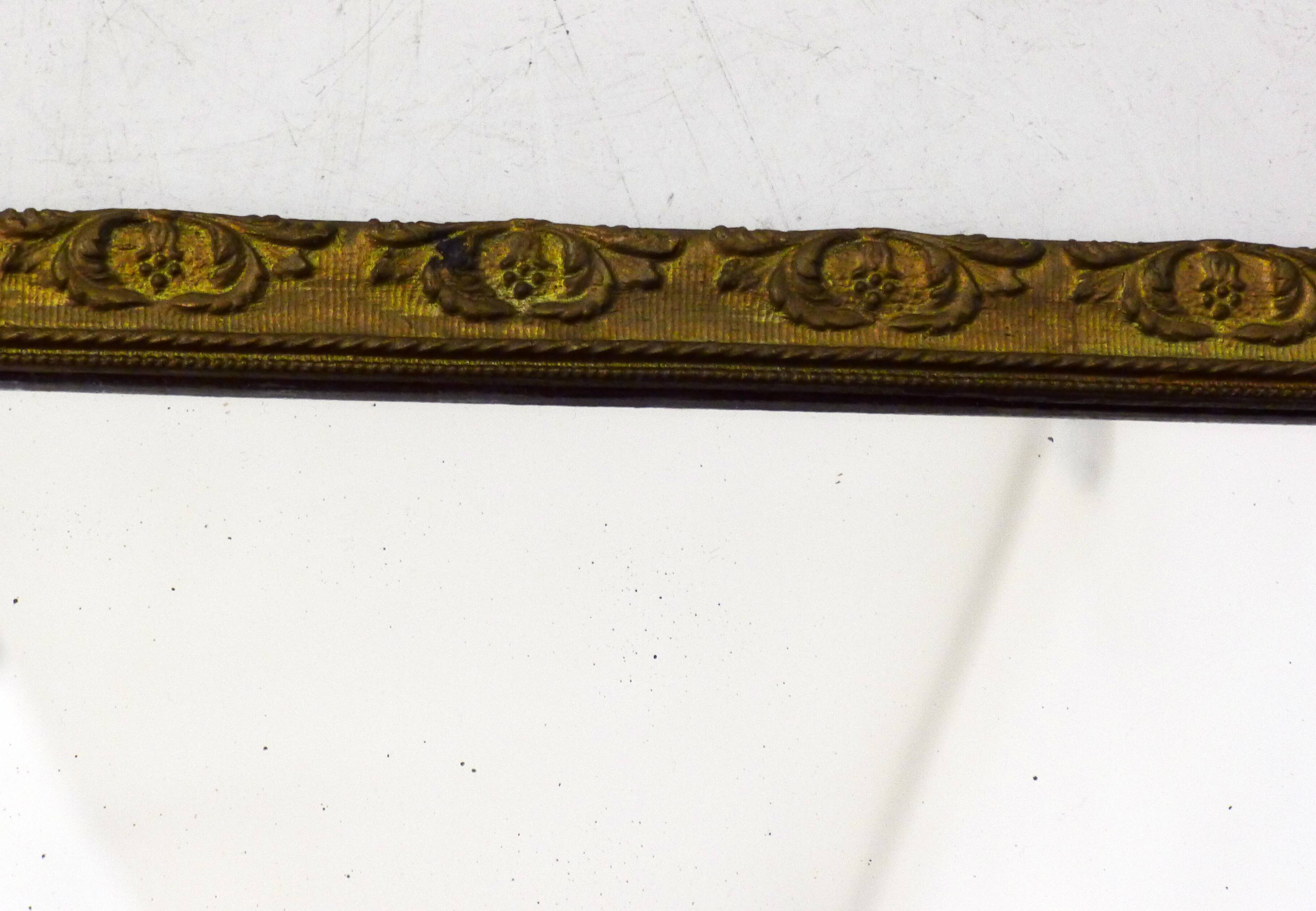 Large elongated gilded mirror