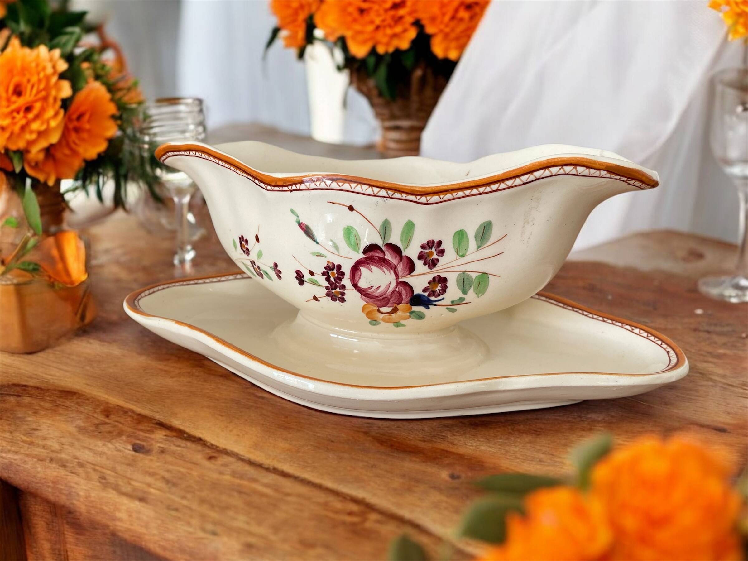 Large antique sauceboat in Longchamp earthenware.