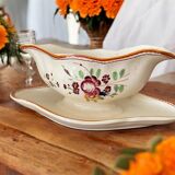 Large antique sauceboat in Longchamp earthenware.