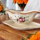 Large antique sauceboat in Longchamp earthenware.