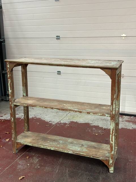 Teak shelves with a green patina