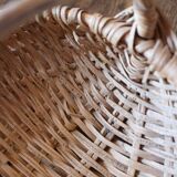 Light wicker oval basket with vintage round handle