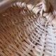 Light wicker oval basket with vintage round handle