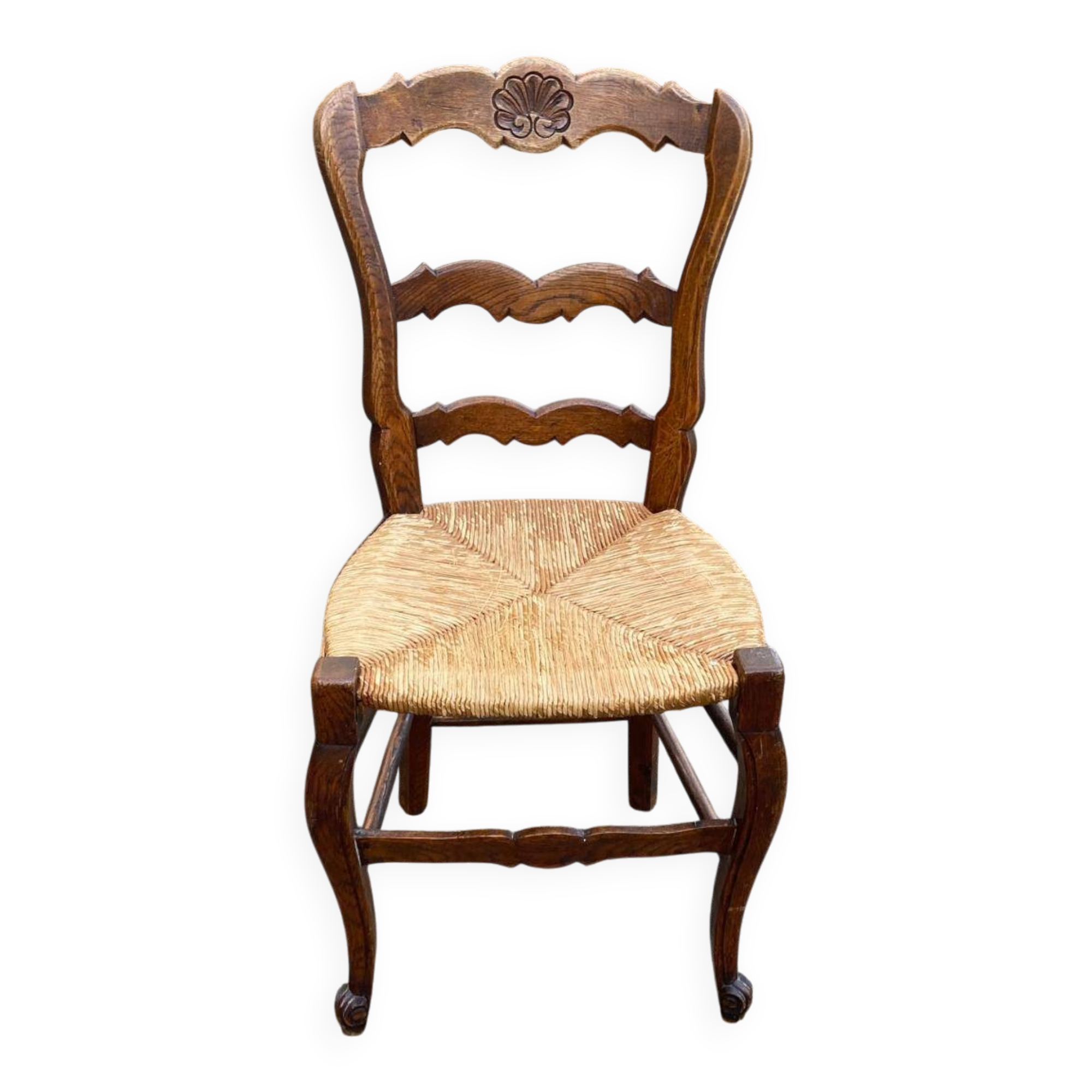 Louis XV 18th century solid wood dining chair with a straw seat.