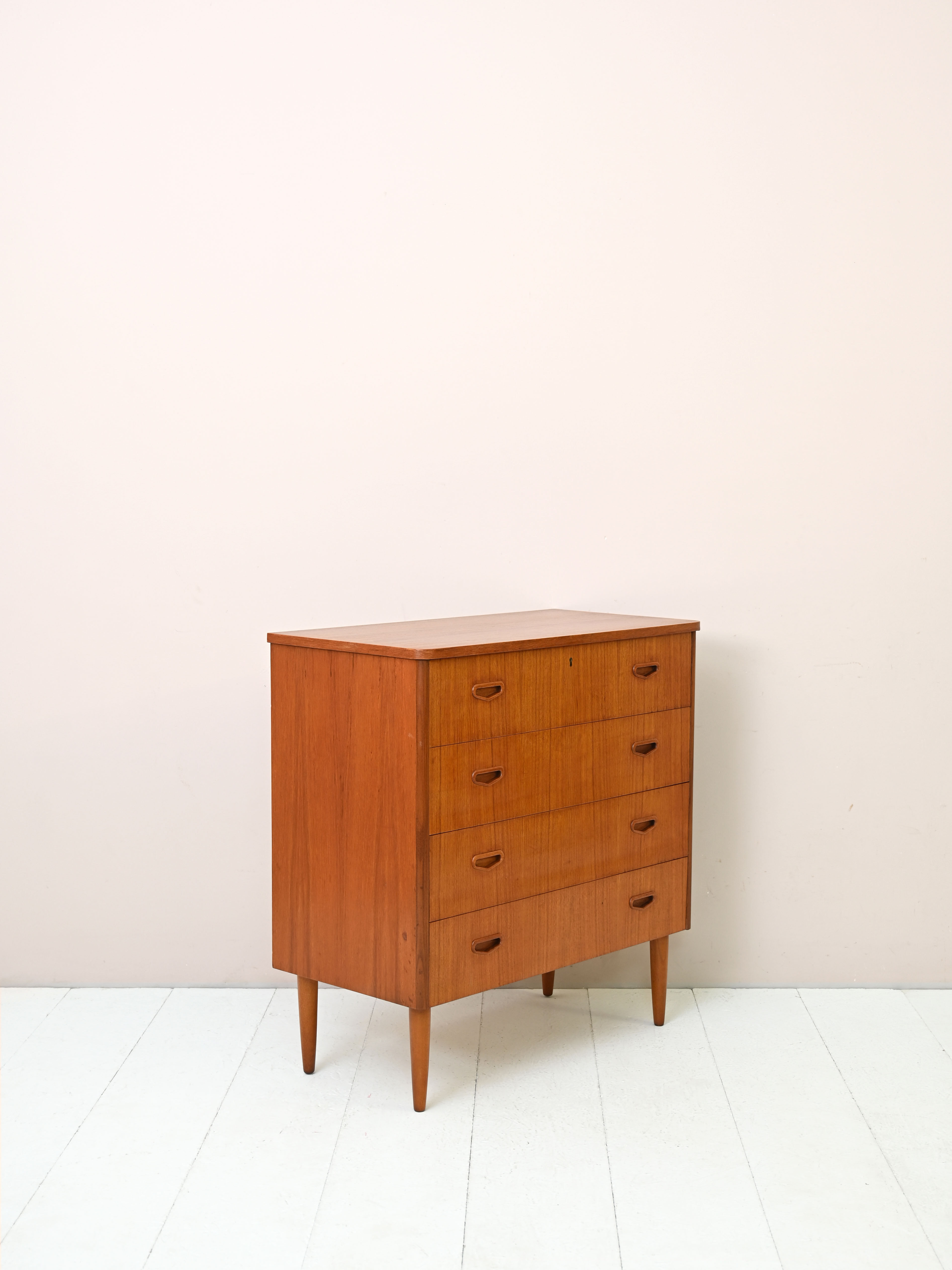 Vintage teak dresser with four drawers