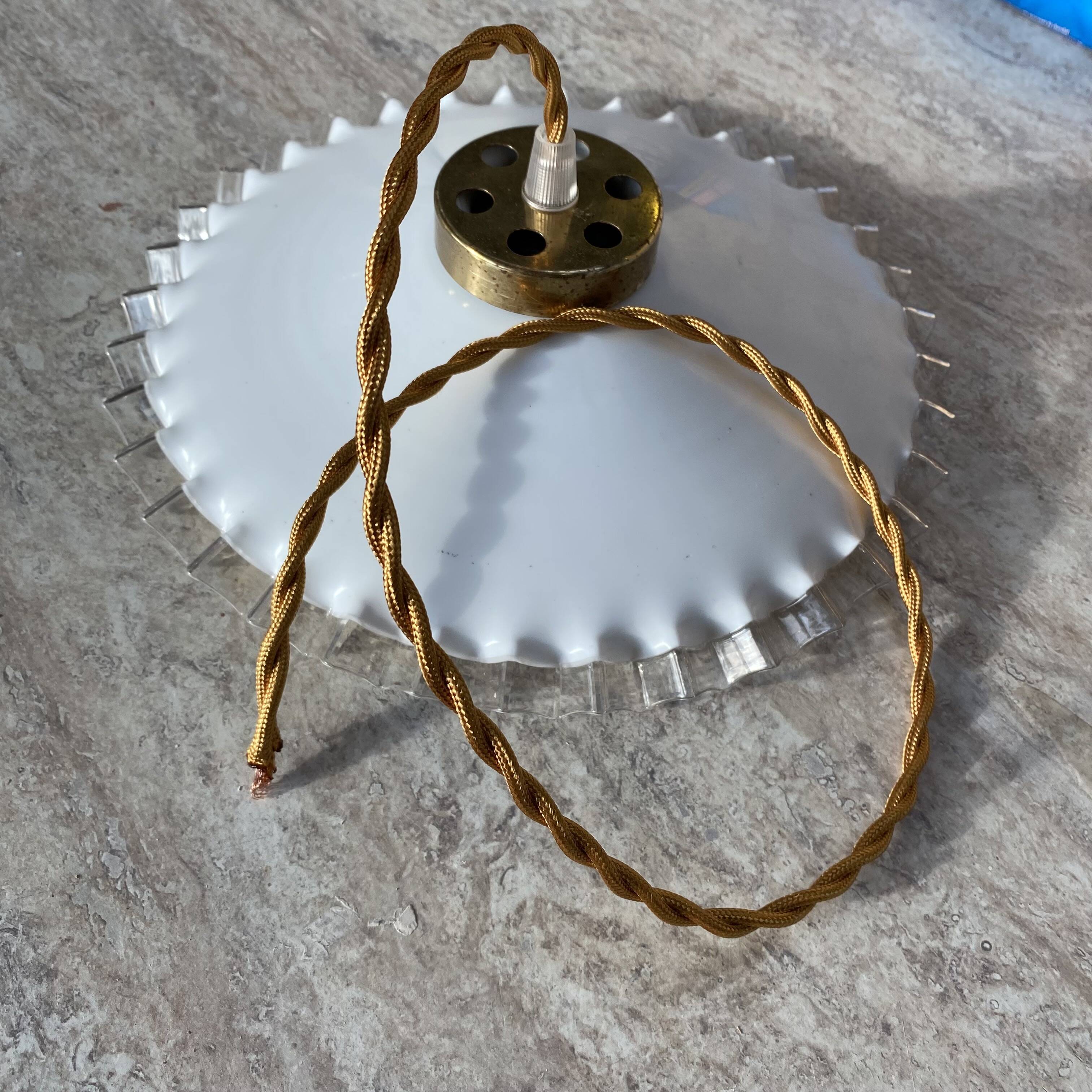 White opaline pendant light with transparent serrated edges