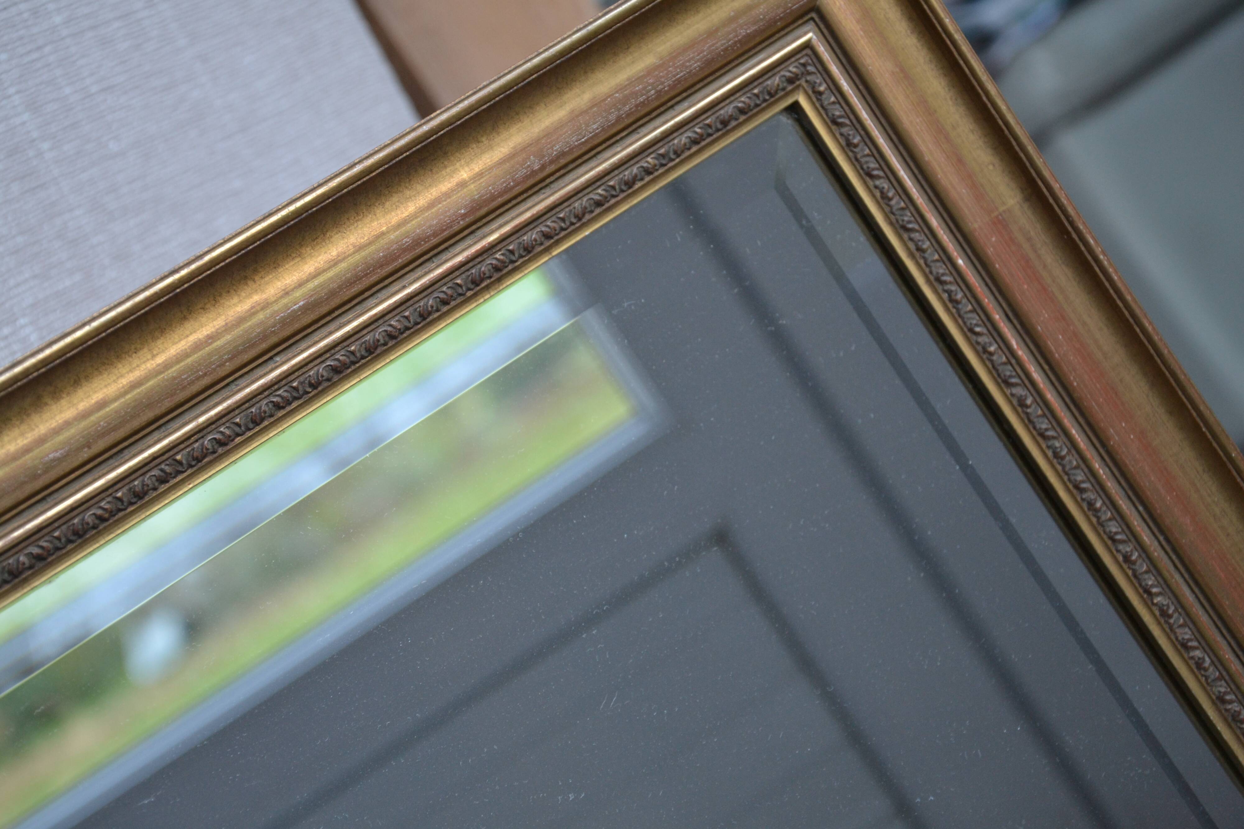 Beveled golden mirror