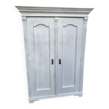 Vintage two-door wardrobe in painted white wood — late 19th century Hungarian style.