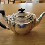 Chiseled silver teapot