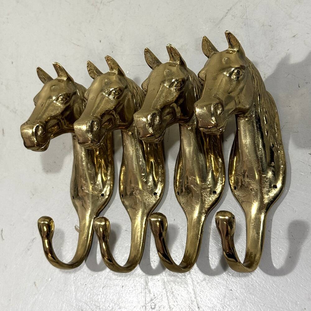 Brass horses coat hooks 1960’s, set of 4