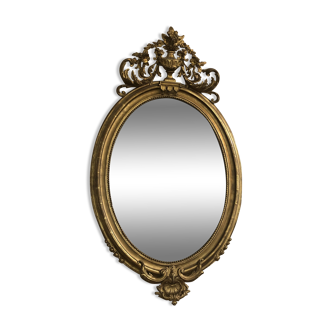 Oval mirror gilded with leaf