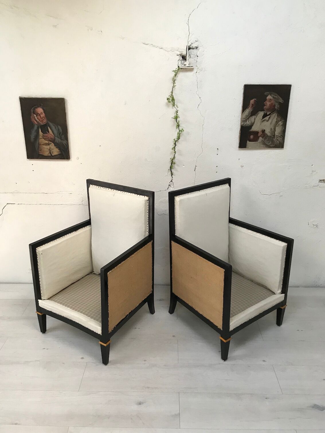 Pair of blackened wooden armchairs