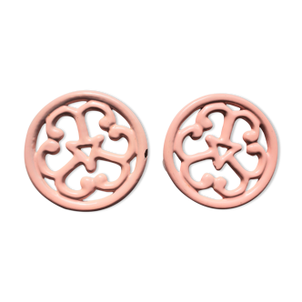 Underside of pink cast iron dishes