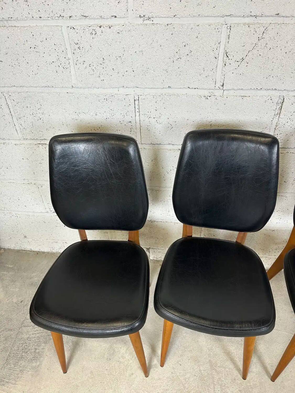 Set of 4 vintage chairs in black leatherette