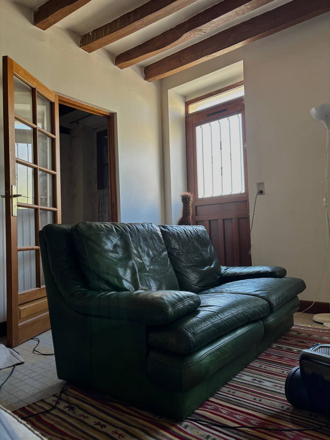 RocheBobois green sofa