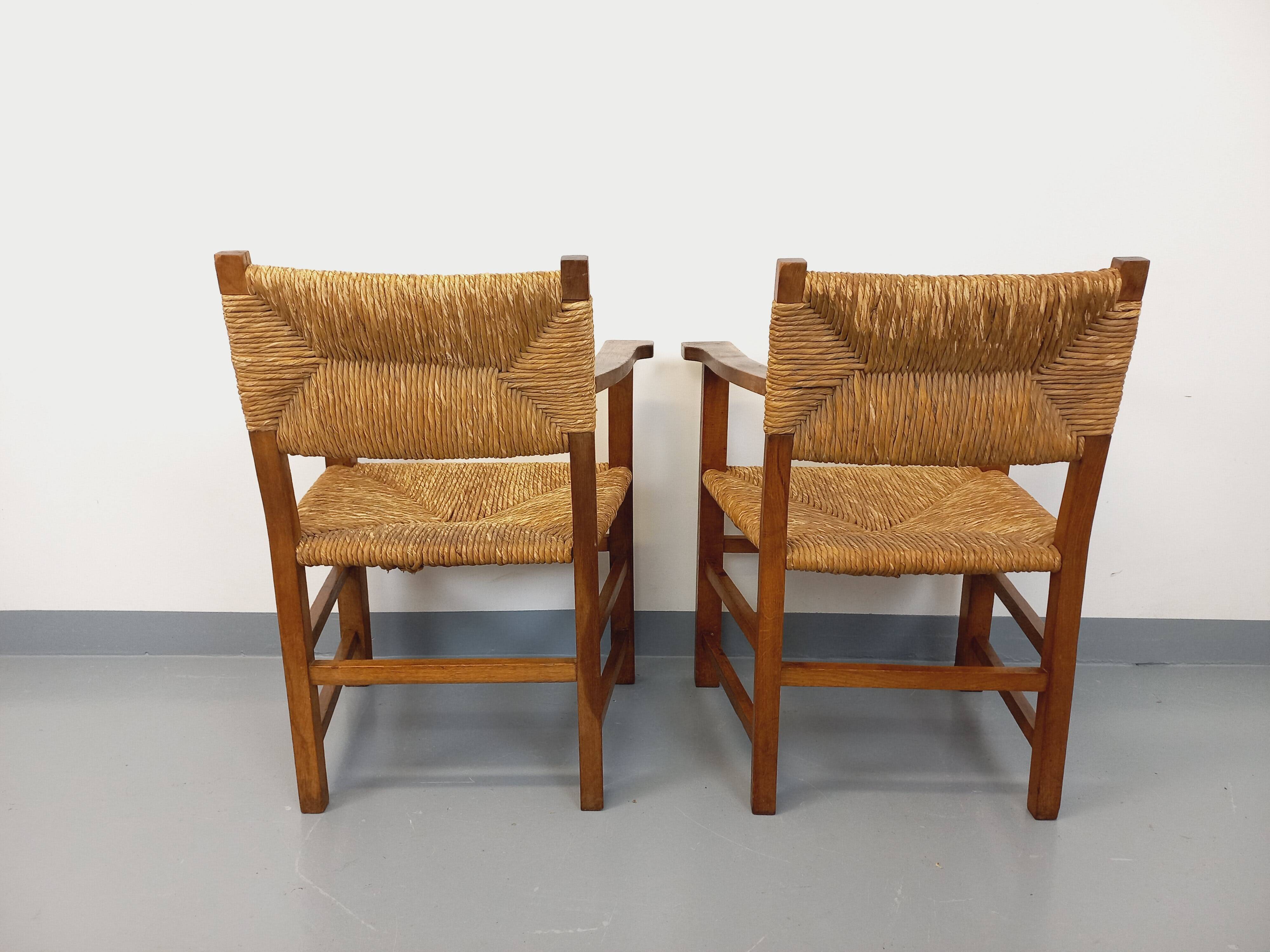 Set of 2 vintage brutalist armchairs in oak wood and straw