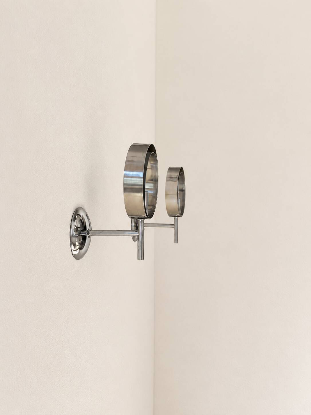 Pair of vintage chrome metal wall lights, France, 1970.