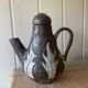 Enamelled terracotta teapot signed Keka