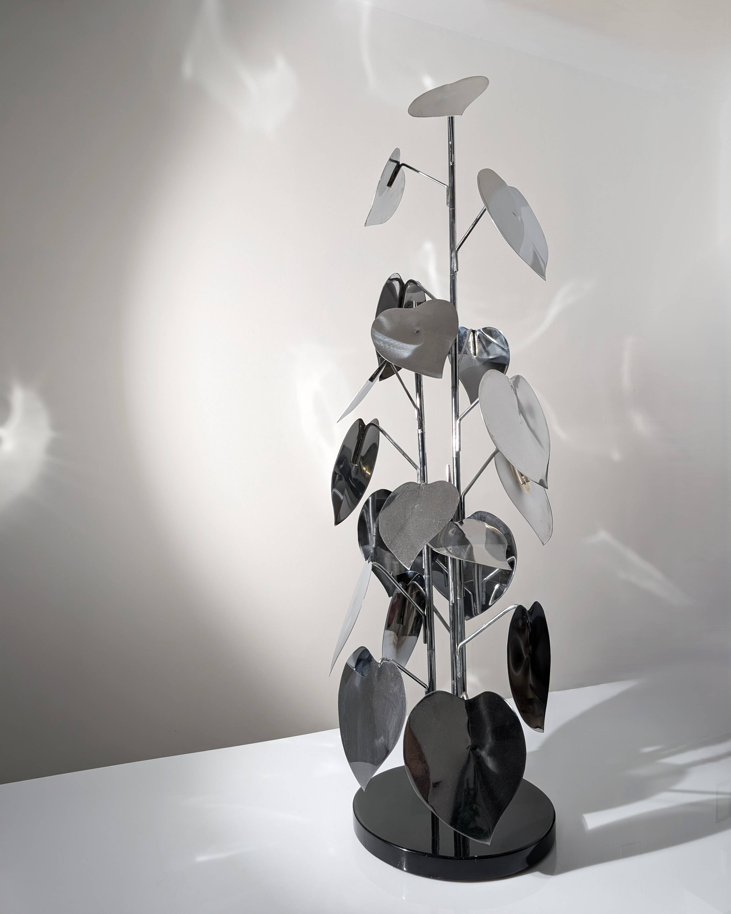 Standing sculpture with chrome leaves and circular base, 1970s