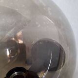 Delmas globe “smoked” wall lamp