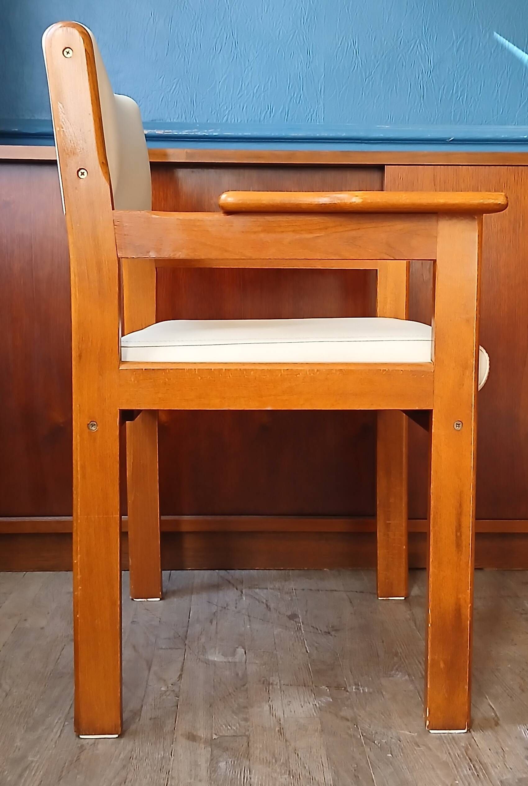 Armchair by André Sornay, stained solid beech & beige faux leather. 1980