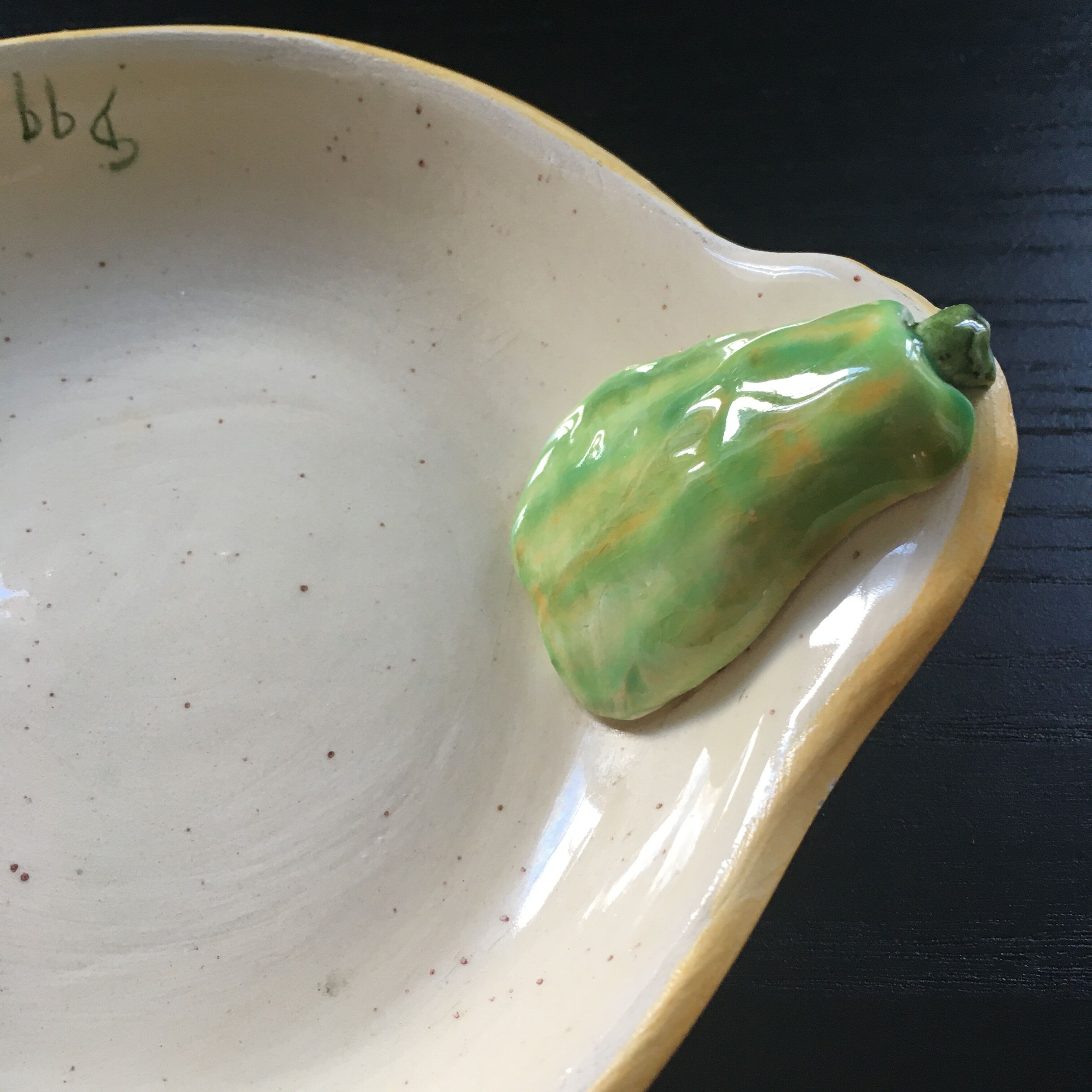 Dish decorated with pears slip