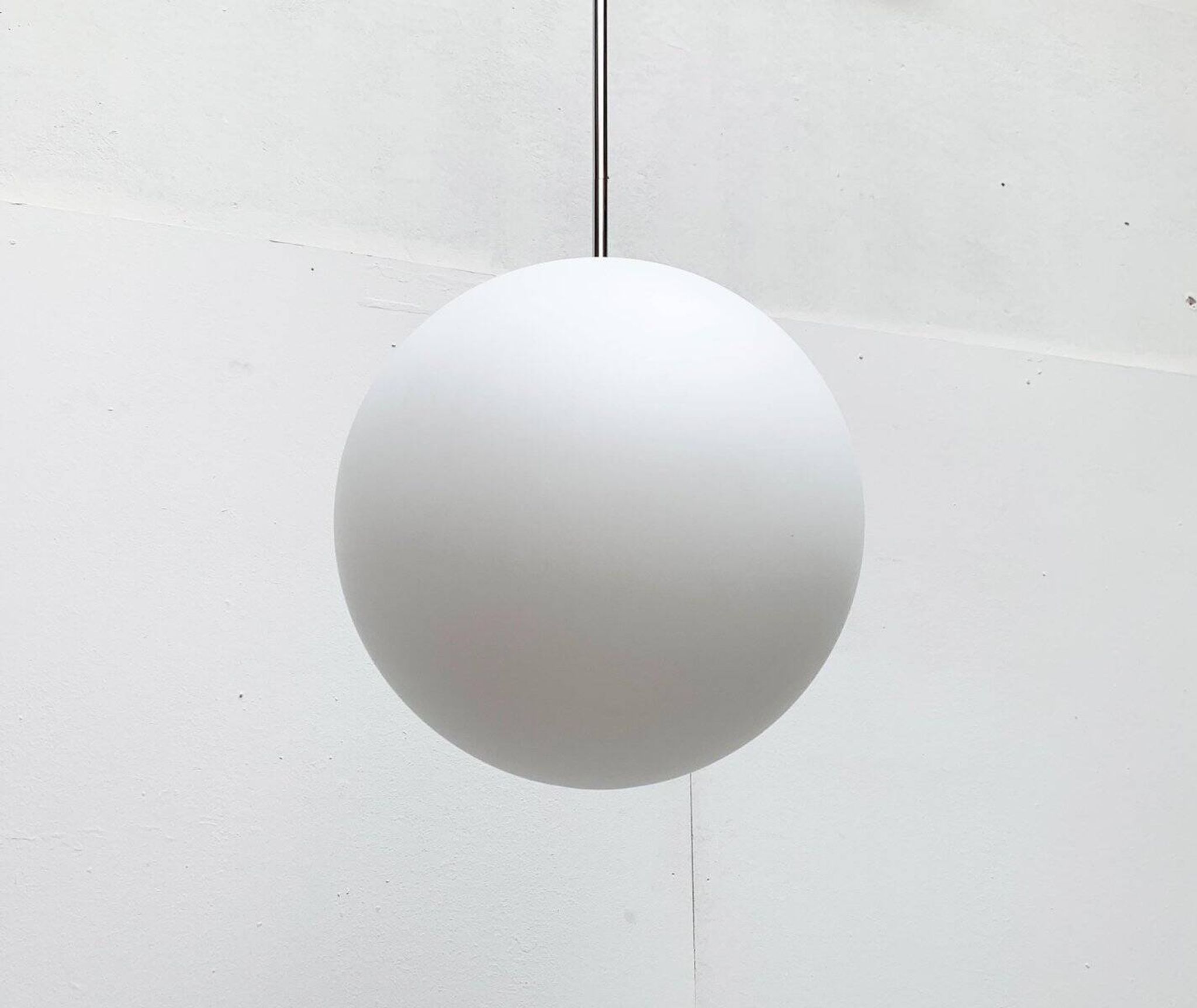 Vintage German space age glass ball pendant lamp by Limburg.