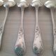 Box of 12 small old spoons in silver metal