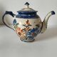Henriot Quimper teapot – floral relief decoration