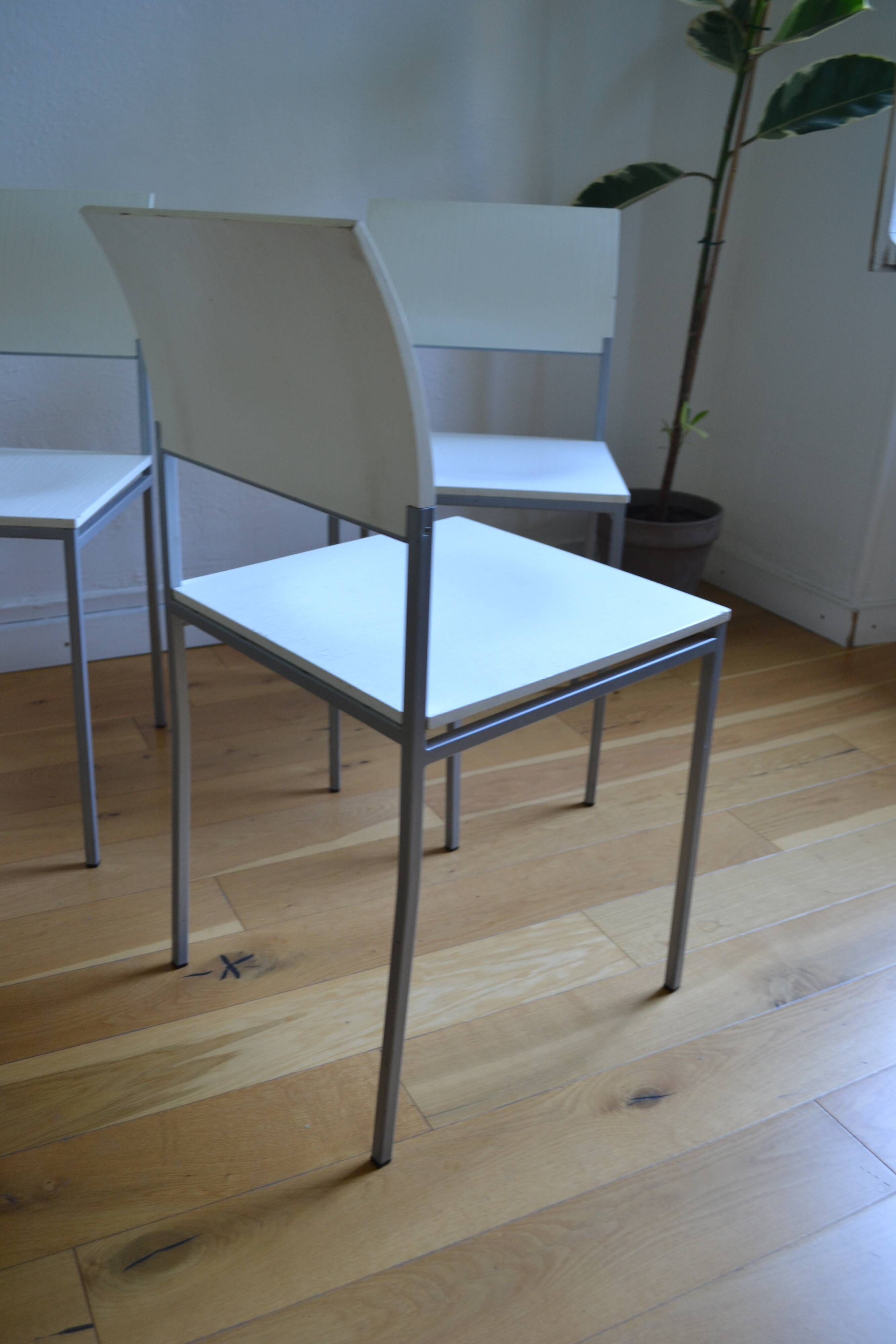 Set of 4 vintage metal and wood chairs from the 1990s.