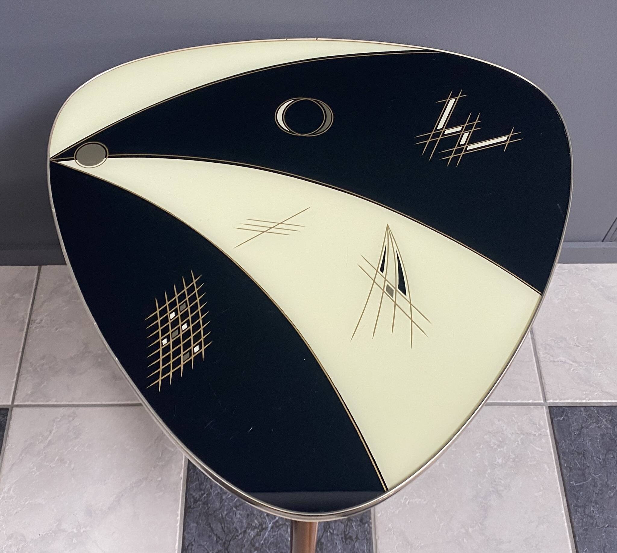 Triangular glass table from the 1960s