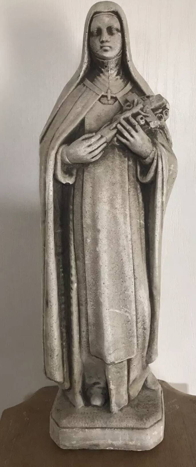 Religious statue of sainte therese of lisieux “the little flower of jesus” in stone