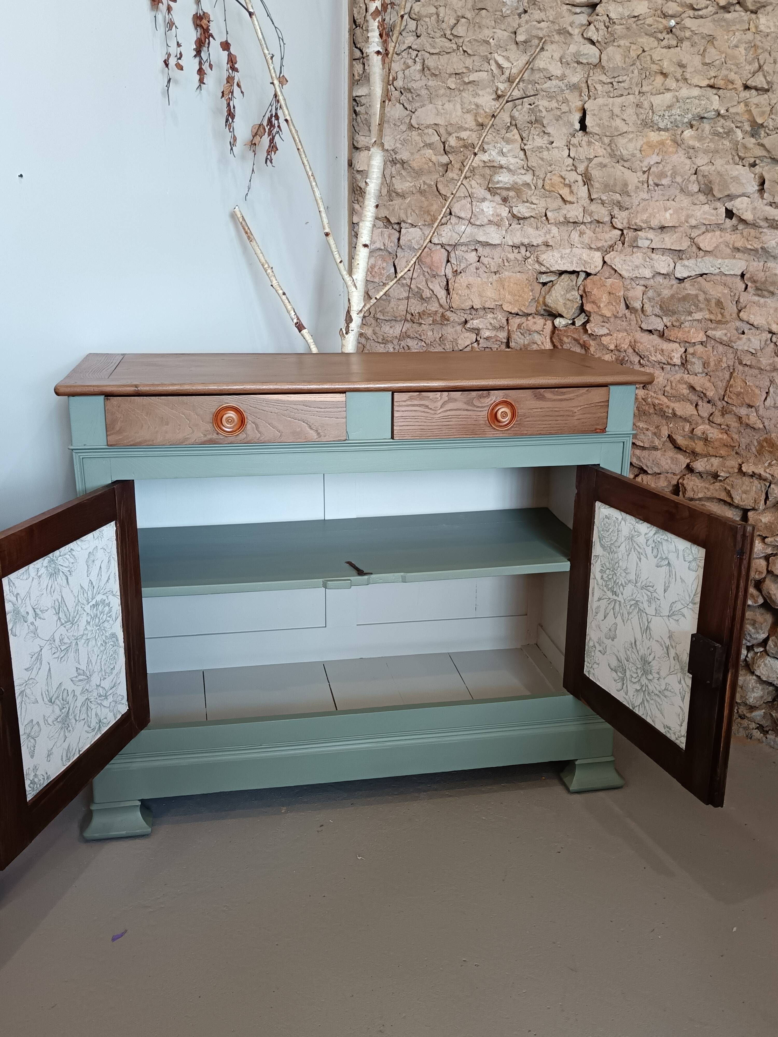 Buffet made of natural wood and bronze green.