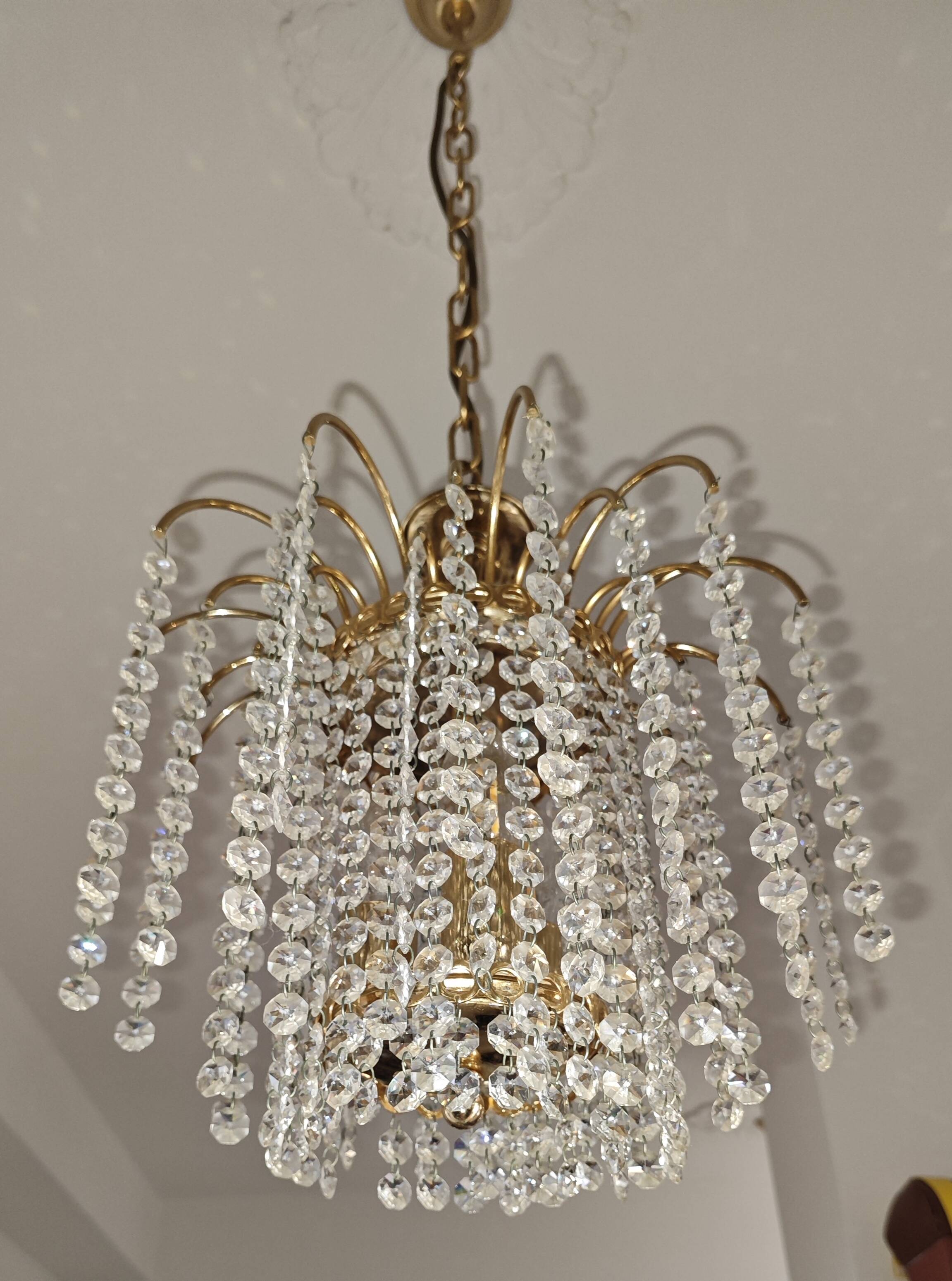 Brass cascading chandelier with crystals