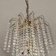 Brass cascading chandelier with crystals
