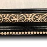 Napoleon III curved mirror, blackened wood frame with cream trim