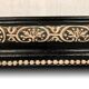 Napoleon III curved mirror, blackened wood frame with cream trim
