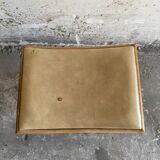 Vintage natural wood stool with light yellow faux leather seat and crossed splayed base