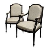 Pair of Louis XVI style armchairs in black lacquered oak. Crocodile fabric cover