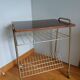 Table trolley for vinyls or magazines in gold metal and formica