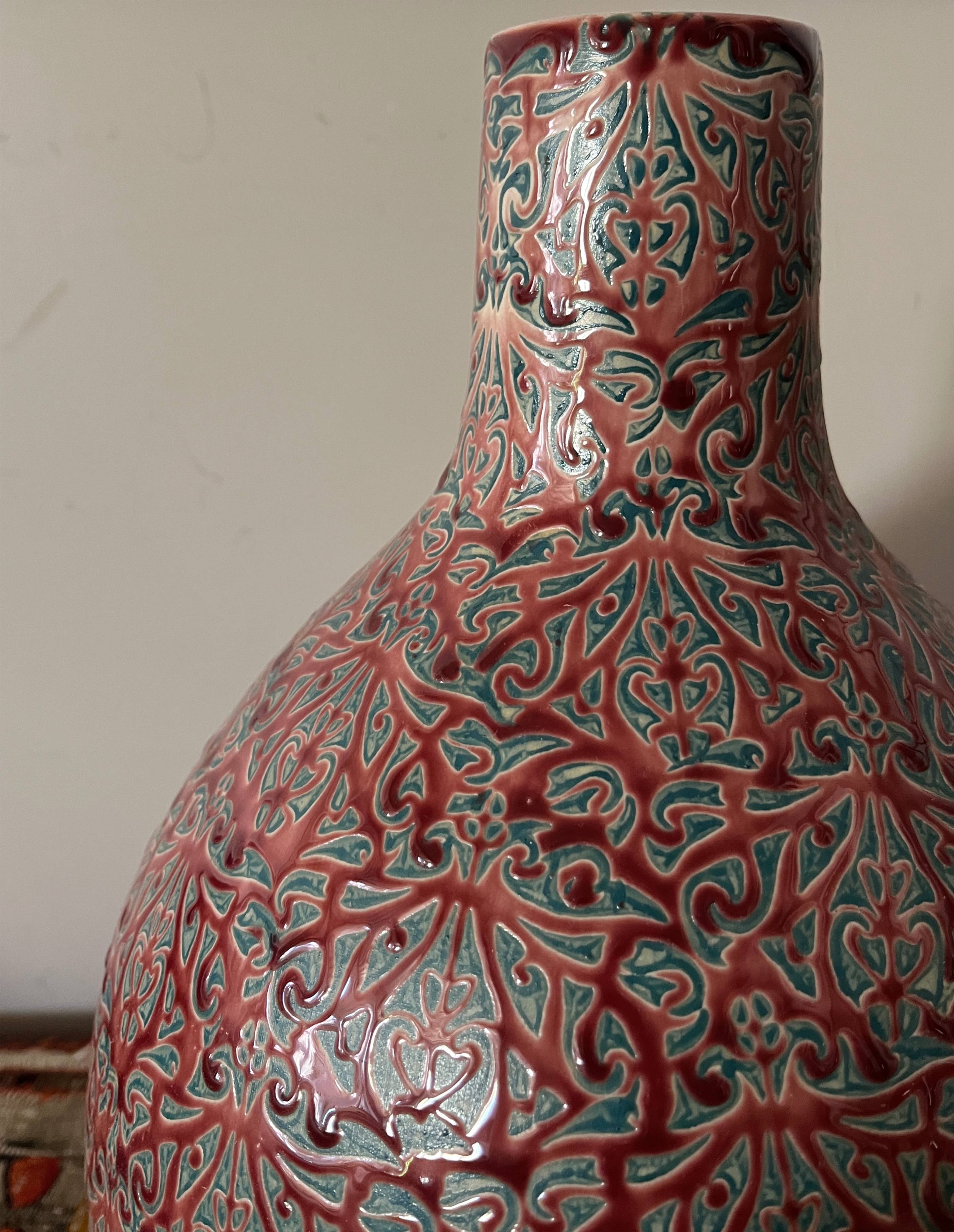 Large ceramic art vase with signed enamel interlacing