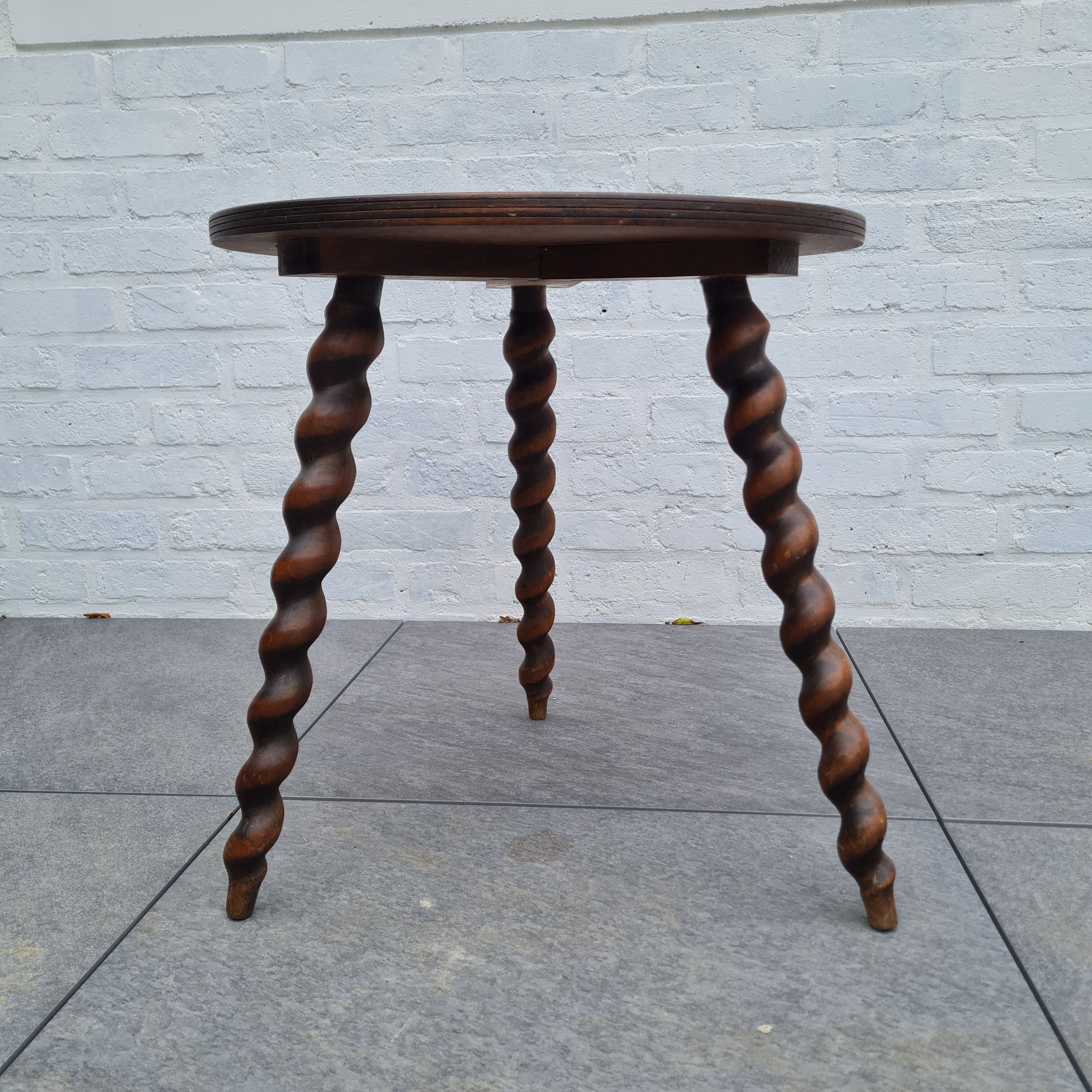 Wooden coffee table twisted tripod base
