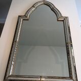 Mirror consisting of multi-faceted mirrors and brass garlands, French work, around 1970
