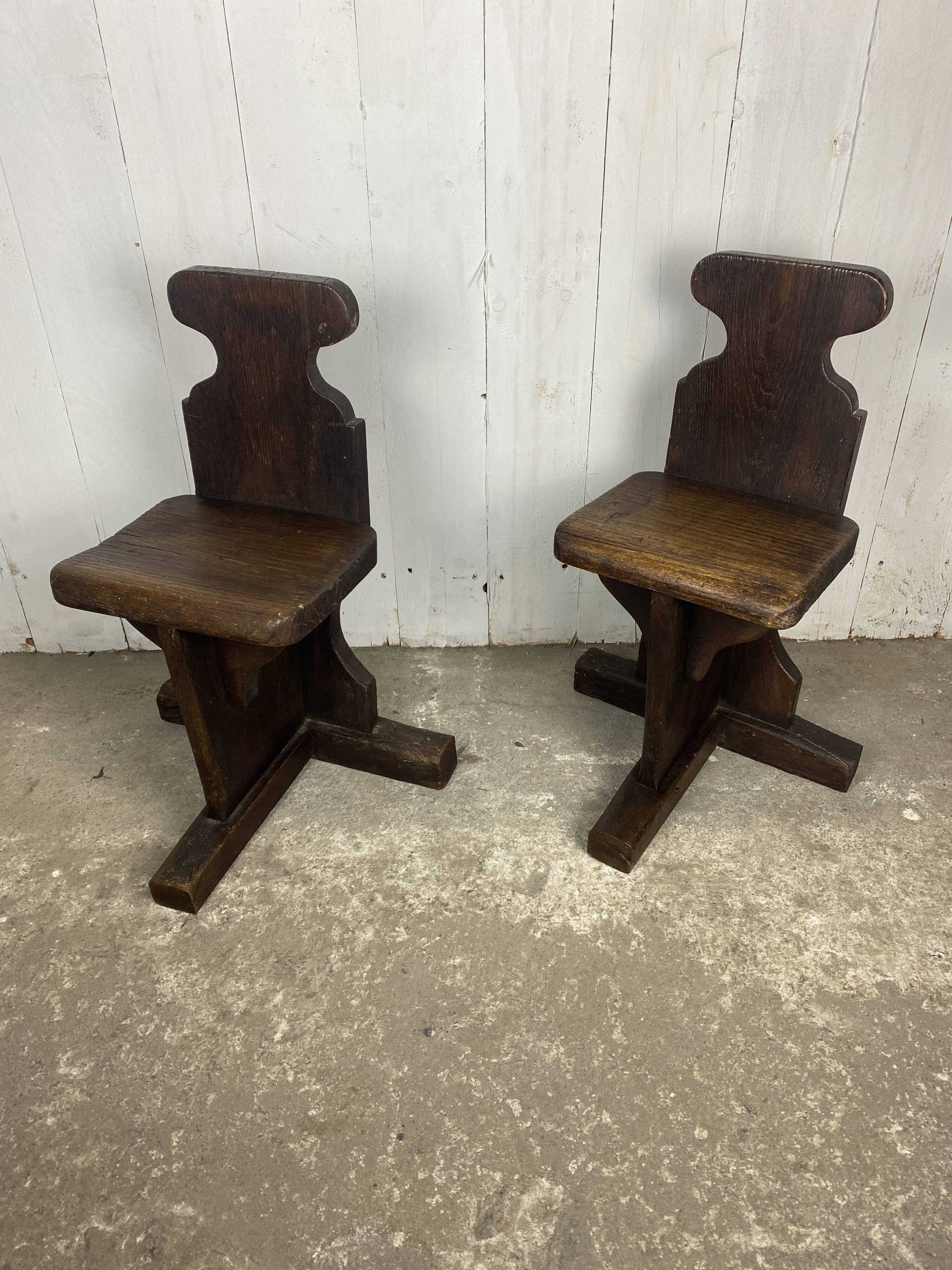 Pair of brutalist oak stools