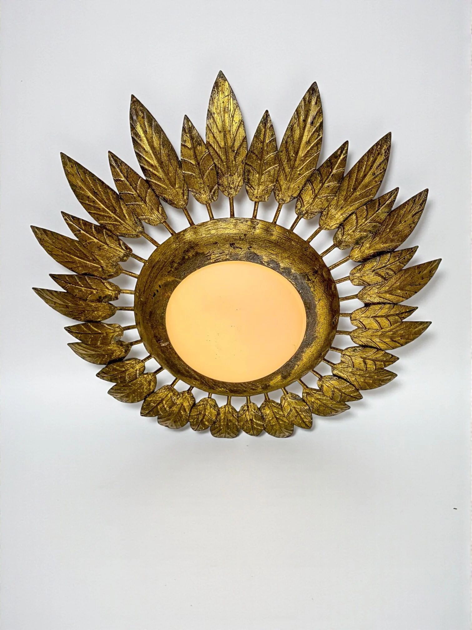 Spanish sunburst ceiling light – opaline glass & gilt iron foliage, 1960s